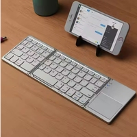 Clavier sans fil portable pliable avec pavé tactile, souris USB filaire, mini BT rechargeable et nouveau produit