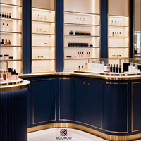Vitrine de présentation de luxe sur mesure pour magasin de beauté - Unité de présentation en métal de haute qualité et verre transparent