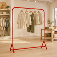 Portant à vêtements rouge vif en métal avec pieds en chevalet en A, présentoir de vêtements pour la vente au détail, personnalisable en usine