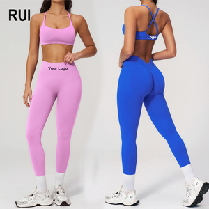 ชุดออกกำลังกายผู้หญิง RUIQUWIN OEM 2026 ชุดโยคะไร้รอยต่อ เสื้อกีฬาแบบไขว้หลัง กางเกงโยคะยืดหยุ่นสูง - Product Image 1