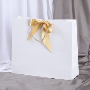 White Paper Gift <b>Bag</b> With Gold Ribbon Handle Luxury Style For Gift And <b>Craft</b> Use - Product Image 1