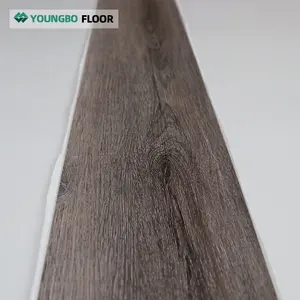 Plancher auto-adhésif LVT en grain de bois 1.8mm Planche de sol arrière sèche résistante à l'usure Revêtement de sol en plastique vinyle de luxe LVT imperméable