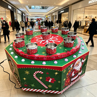 Machine de jeu de lancer de seaux électrique rotative de Noël, jeu de fête foraine avec des boîtes de conserve tournantes, pour location d'événements, stands et parcs d'aventure