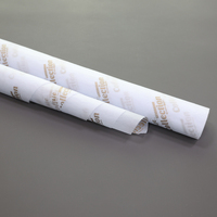 Papier sulfurisé imprimé avec logo personnalisé pour emballer les aliments