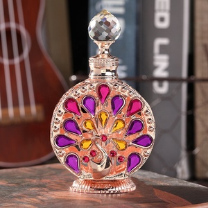 Botella de <span class=keywords><strong>Perfume</strong></span> de Metal con piedras de pavo real, joyería patentada de 12ml, botella de cristal esencial de 0il, rellenable, n. ° 898 - Product Image 3