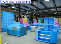 Présentoirs personnalisés pour confiserie, kiosque de vente au détail coloré, étagères à niveaux, comptoir de présentation pour boutique de bonbons, présentoir LED robuste pour centre commercial