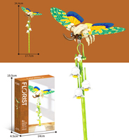Modèle d'insectes libellule, papillon, coccinelle, fleur en briques, blocs de construction pour la décoration de table