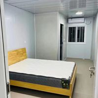 Maison mobile modulaire préfabriquée en acier de 20 pieds, conteneur portable au design moderne pour bureau à domicile, hôtel, magasin, toilettes extérieures