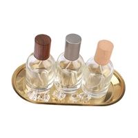 Flacon de parfum cylindrique de luxe à prix d'usine, base lourde, Dubaï, 30 ml, vide, avec pompe pulvérisatrice et sérigraphie sur bois