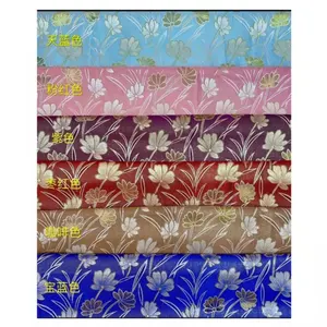 Золотистый жаккард из 100 полиэстера, используемый для домашнего текстиля и одежды, ткани, яркие цветные жаккардовые занавески