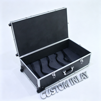 Valise à roulettes en aluminium noir avec roues intégrées, poignée télescopique, serrures à clé et sangles à boucles, valise à outils roulante