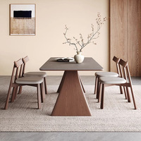 Table à manger minimaliste française en bois massif, ensemble table et chaises modernes en pierre frittée pour la salle à manger à domicile