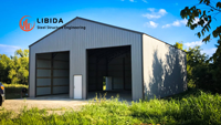 Bâtiment préfabriqué économique et résistant au vent pour le transport de marchandises commerciales, entrepôt à structure en acier