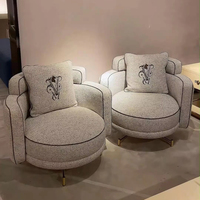 Fauteuil individuel de luxe léger italien, design moderne et épuré, pour salon de villa, chaise de loisirs en tissu pour la maison