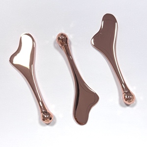 Rouleau de massage pour les yeux en or rose, outil Gua Sha pour le visage, très populaire - Product Image 5