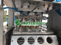 Machine de remplissage de tasse de dosage de liquide volumétrique automatique