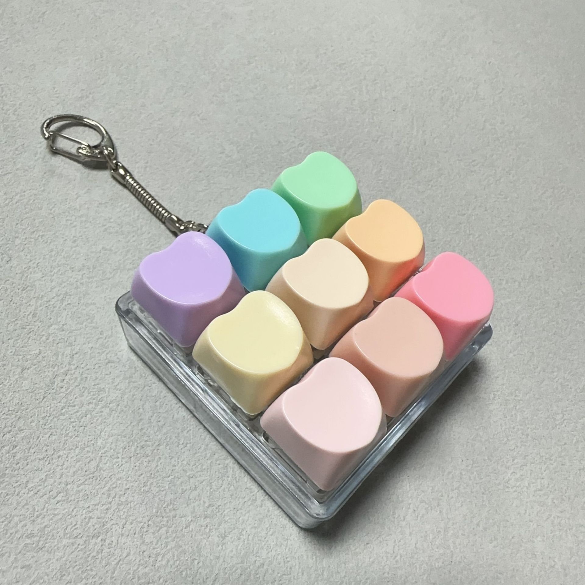 Nueve teclas transparentes - corazón arcoíris - sin luces