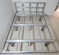 Lit mezzanine modulaire en profilés aluminium avec bureau intégré et tiroirs de rangement coulissants pour appartement et dortoir