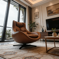 Fauteuil pivotant en cuir marron : coussin capitonné, siège confortable pour salon