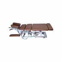 Lit de chiropratique électrique et manuel réglable en acier doux pour hôpital, avec table escamotable pour la physiothérapie