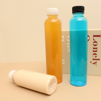 En stock 150ml 200ml 250ml 300ml 350ml 400ml 450ml 500ml Bouteille ronde en plastique PET de qualité alimentaire pour boisson au jus avec couvercle