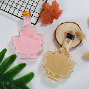 Bouteille en verre de sirop unique en forme de feuille d'<span class=keywords><strong>érable</strong></span> d'une capacité de 50ml 100ml 250ml pour la tequila et le <span class=keywords><strong>rhum</strong></span> foncé avec couvercle - Product Image 4