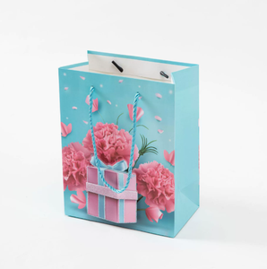 Sac cadeau floral en papier, fabriqué en carton épais et couché, avec poignées en corde de papier, impression couleur intégrale, découpe à la presse. - Product Image 1