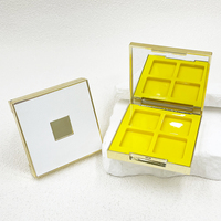 Récipient de palette d'ombres à paupières à quatre couleurs avec pinceau avec poudre de fard à joues miroir Boîte en plastique vide compacte Matériau d'emballage personnalisé