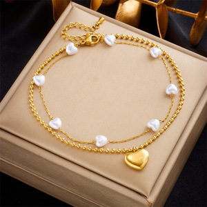Chaîne de cheville double en acier inoxydable doré avec perles irrégulières et breloques cœur gravées, style féerique pour femme, idéale pour l'été à la plage - Product Image 4