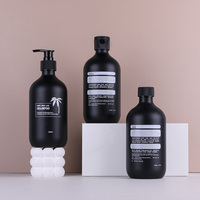 Bouteille vide de shampooing et d'après-shampooing PET écologique de luxe en gros de 500ML pompe cylindrique Lotion hydrosol noire bouteille vide