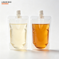 Pochette à bec verseur en plastique transparent imprimée sur mesure pour l'emballage de jus/eau/liquides - Sachet souple anti-fuite avec bouchon à vis
