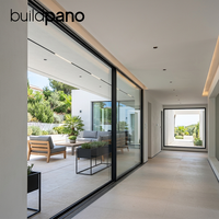 Porte coulissante moderne en aluminium du sol au plafond avec rail dissimulé et panneaux de verre insonorisés pour cour et jardin
