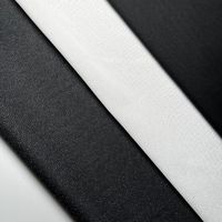 Entoilage thermocollant en sergé noir et blanc 100 % polyester, tissé par jet d'eau, fourni par l'usine