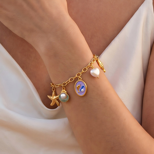 Nouveau bracelet en or plaqué 18 carats avec perle de dauphin pour femmes, bracelet multi-breloques en acier inoxydable, merveilles de l'océan - Product Image 2