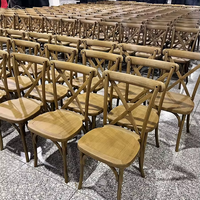 Chaise en résine plastique à dossier croisé démontable de 800 lb pour la location en gros, idéale pour les hôtels, banquets, mariages et événements