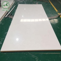 Panneau laminé haute brillance UV de qualité E1 Panneau aggloméré face à la mélamine 18mm 16mm 4x8 Panneau de particules en PVC Mfc pour meubles