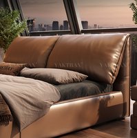 Lit double de style italien haut de gamme en cuir véritable, design oreilles d'éléphant, le premier choix des designers