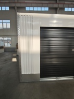Unité de stockage extérieure moderne en acier, mini-bâtiment de haute qualité, solution d'atelier et d'entrepôt avec porte enroulable