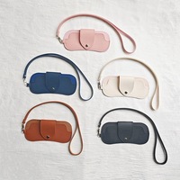 Nouvel étui à lunettes en cuir PU à suspendre au cou, motif uni tendance, parfait pour ranger différents types de lunettes