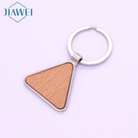 Vente en gros d'ébauches de sublimation personnalisées Porte-clés en bois simple avec ouvre-bouteille en métal pour graver des porte-clés en bois