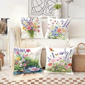Almohadas florales que decoran un sofá acogedor con medias navideñas y astas de ciervo en el fondo - Product Image 2