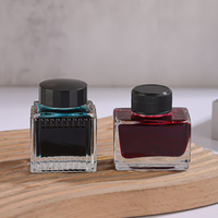 Bouteilles en verre d'encre transparente de forme carrée personnalisée de haute qualité 15ml 25ml 30ml 50ml avec couvercle à vis phénolique