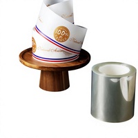 Rouleau de protection alimentaire transparent jetable et compostable sur mesure, feuille plastique transparente pour gâteaux, mousses au chocolat et autres préparations.