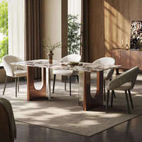 Table de salle à manger contemporaine haut de gamme en pierre frittée écologique avec piétement métallique bicolore pour villa de luxe