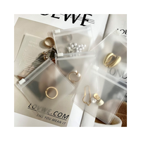 Sac à bijoux avec logo personnalisé, sac sous vide de sécurité, petit sac à fermeture éclair givré en EVA PVC pour le rangement des bijoux avec lunettes, colliers