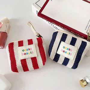 กระเป๋าเครื่องสำอางแบบพกพาขนาดเล็ก ทนทาน สีสันสดใส ผ้าลายก้างปลา พร้อมซิป ขายส่ง MOQ ต่ำ - Product Image 3