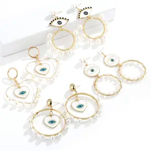 Nuevo diseño de moda, Blanco declaración mal ojos pendientes hechos a mano de oro corazón colgante de perlas pendientes para las mujeres