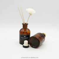 Vente en gros Bouteille vide ronde de luxe avec diffuseur d'arôme en verre ambré 125ml 250ml