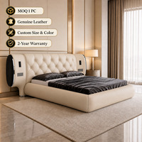 Cadre de lit king-size moderne de luxe en cuir véritable capitonné avec tête de lit ovale capitonnée et prises électriques pour chambre d'hôtel