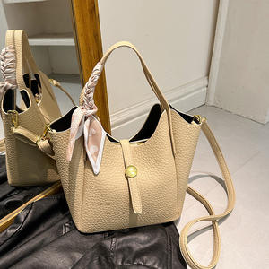 Sac seau au design original, sac à bandoulière sophistiqué pour femme, sac à main élégant et polyvalent. - Product Image 2